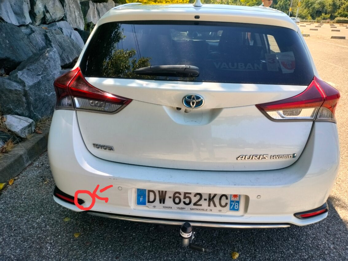 Défaut pare-chocs arrière constaté lors d'une inspection automobile